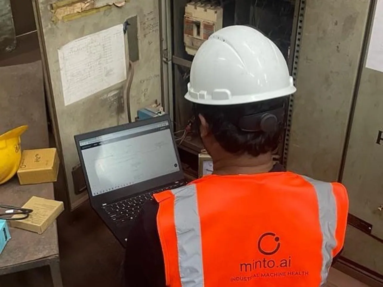 Engineer at the motor control cabinet